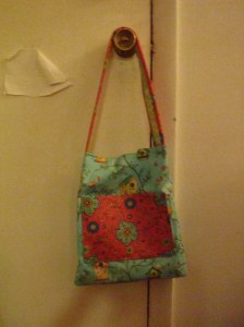 Cute blue birdy bag with bright pink pocket!