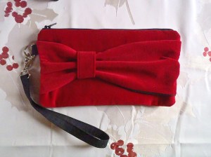 A Marilyn wristlet in a festive holiday red.