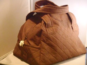 A spacious to-work bag. It can hold everything from your iPad to your gym shoes.