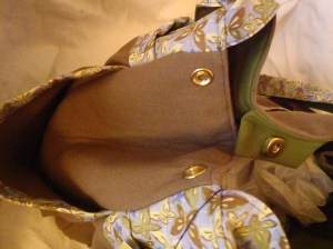 Ingrid - a view of the pop-snap closure. There are pop-snaps on each end.