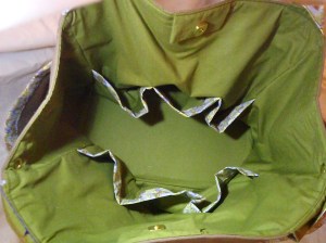 Ingrid on the inside. Lots of pockets and a magnetic snap closure.