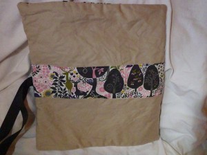 The back of the knitting roll. A really nice canvas with a whimsical cotton stripe.