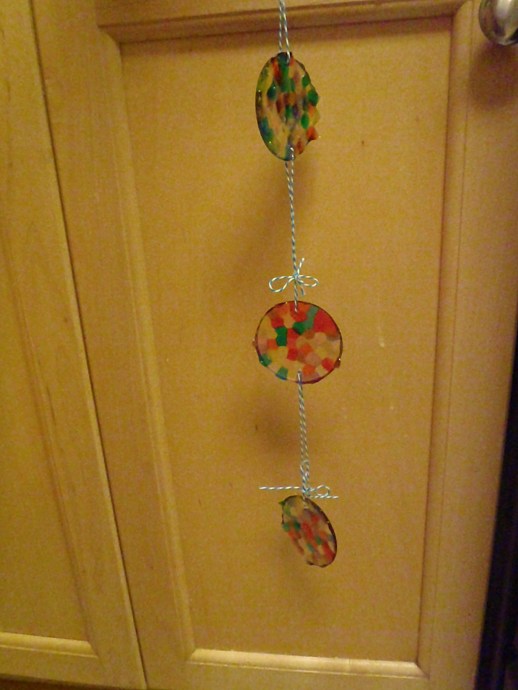 A set of three to hang down from a porch eave or a long window.