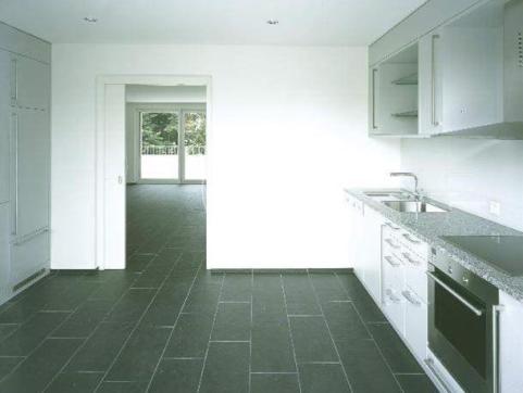 View of the kitchen into the living room.