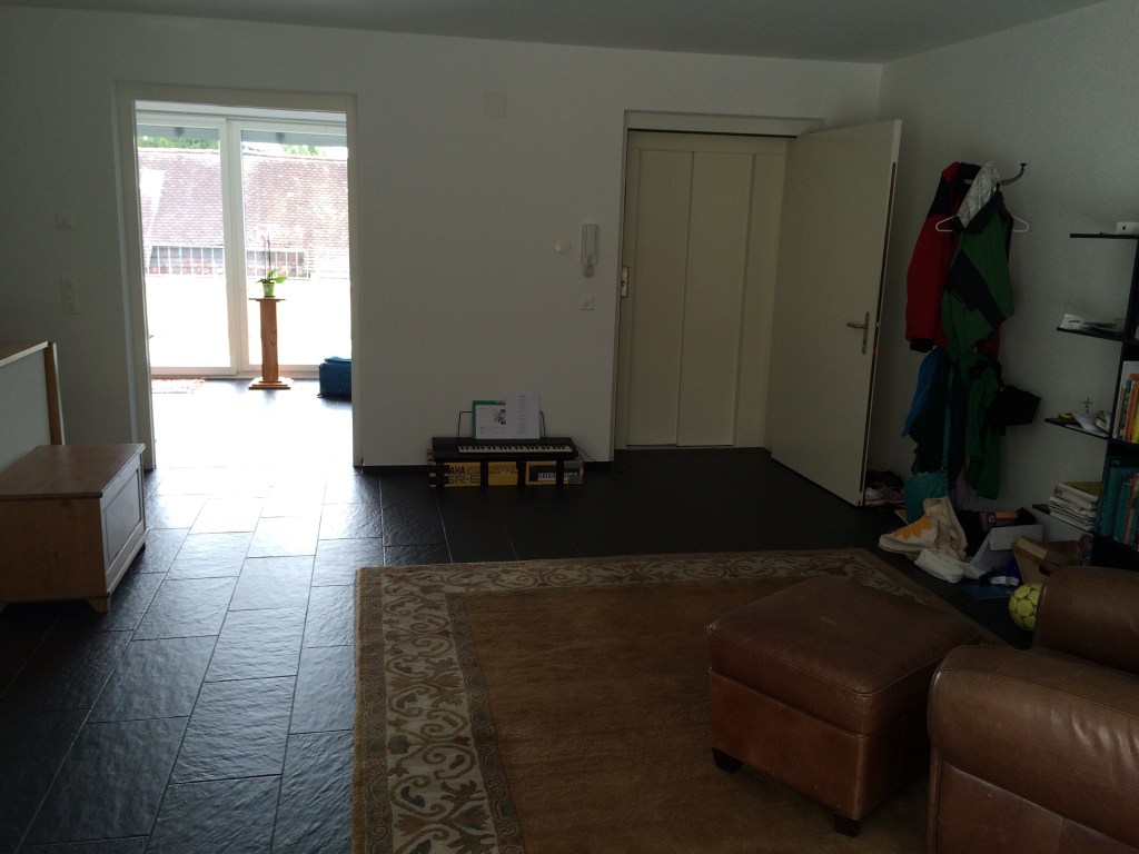 The living room, sans chairs. That would require me to clean again and I'm not up to it.