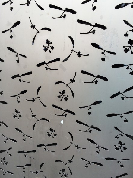 We found this door at a park. It's metal and those are meticulous cutouts in the metal.  Another one for the file.