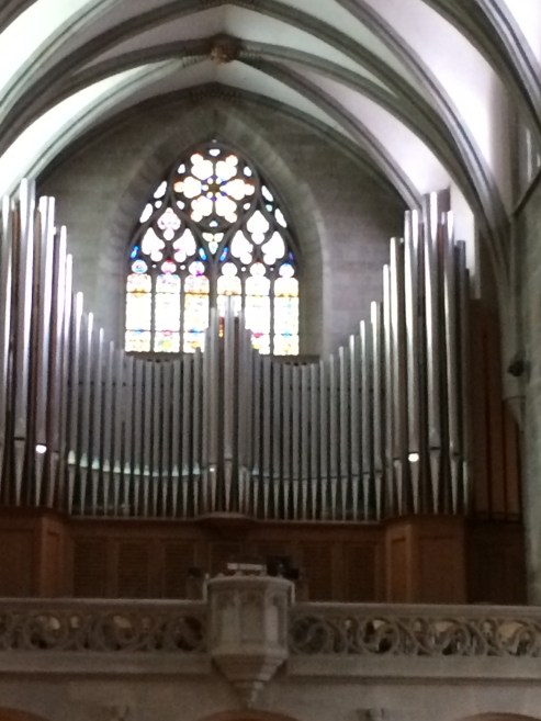 The organ and a stained glass window by Giacometti made in 1940.