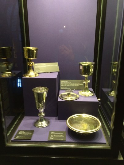 One of 5 cases of gold and silver communion plate.