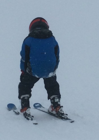 H in his "racing tuck" position.